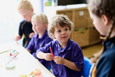 male-student-learning-with-pencils