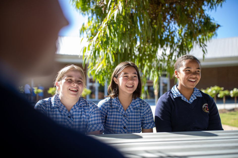 Henderson college students smiling