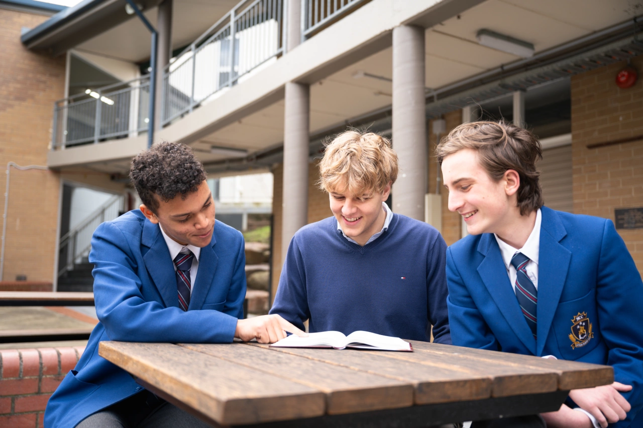 Secondary students reading bible