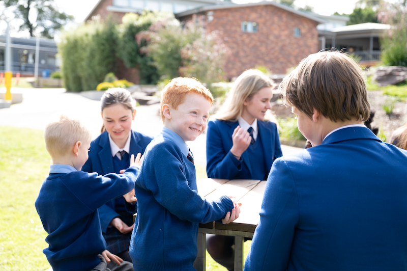 Primary Secondary Students at table