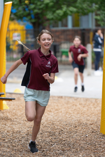 Primary student running 2024